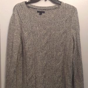 A large , gray Tommy Hilfiger sweater